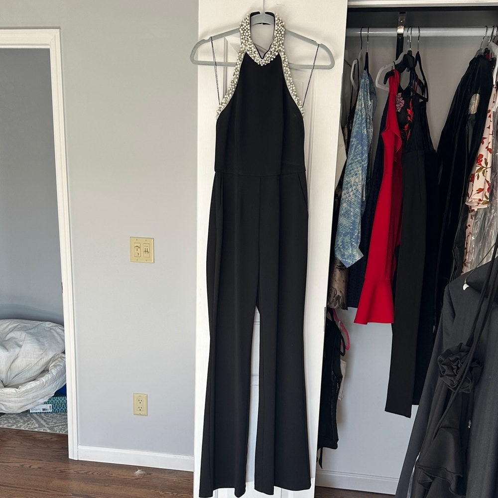 Elegant Black Jumpsuit with Embellished Collar